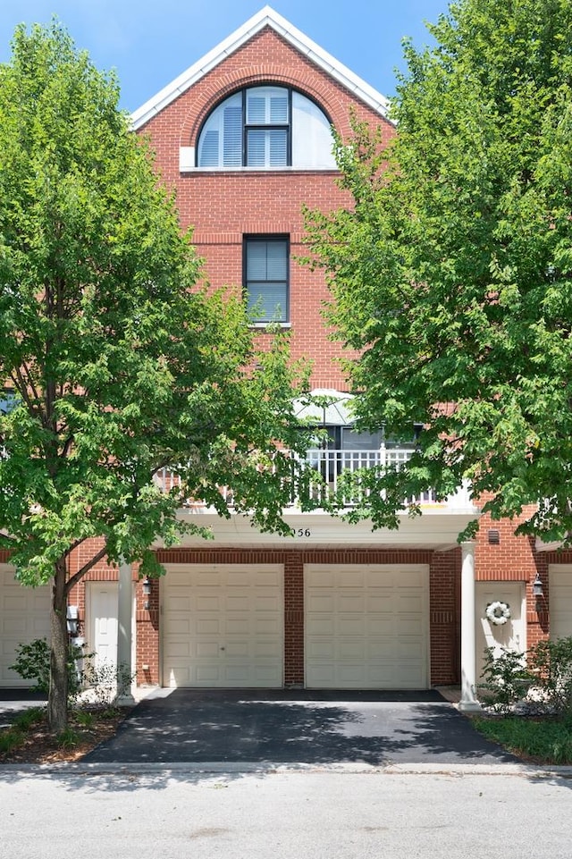 2056 Valor Ct, Glenview, IL 60026 - view of property with asphalt driveway, brick siding, and an attached garage