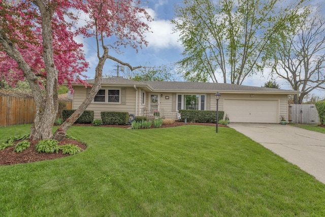 ranch-style house with concrete driveway and a garage