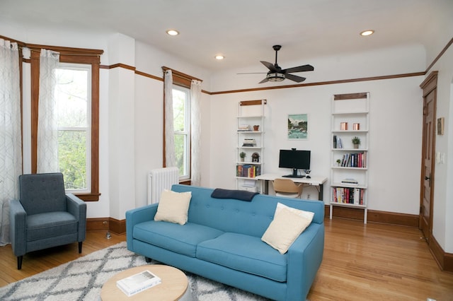 5338 S Greenwood Ave Unit 3, Chicago, IL 60615 - living area featuring radiator heating unit, light wood-style floors, baseboards, ceiling fan, and recessed lighting