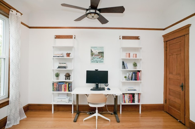 5338 S Greenwood Ave Unit 3, Chicago, IL 60615 - office area with wood finished floors, a ceiling fan, and baseboards