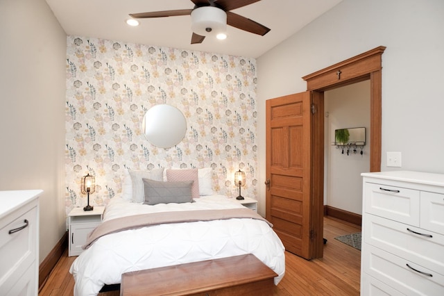 5338 S Greenwood Ave Unit 3, Chicago, IL 60615 - bedroom featuring light wood-type flooring, baseboards, recessed lighting, wallpapered walls, and ceiling fan