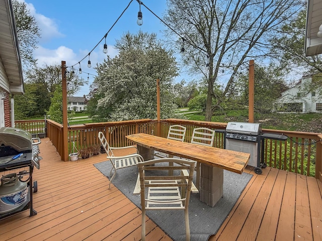 1612 Parkside Ct, Freeport, IL 61032 - wooden terrace with a grill and outdoor dining area