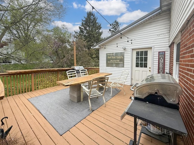 1612 Parkside Ct, Freeport, IL 61032 - wooden deck with outdoor dining area