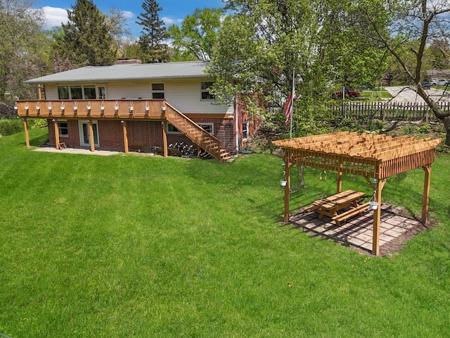 1612 Parkside Ct, Freeport, IL 61032 - back of house featuring a patio, a deck, a lawn, and stairs