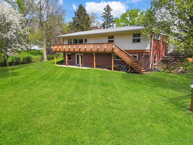 1612 Parkside Ct, Freeport, IL 61032 - rear view of house with a yard, a wooden deck, brick siding, and a chimney