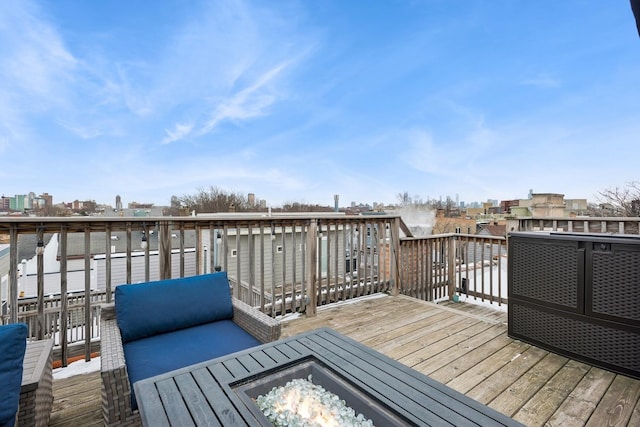 deck with an outdoor fire pit