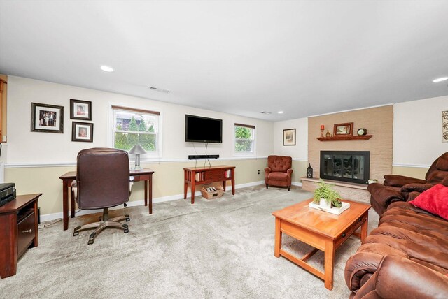 7513 Rohrer Dr, Downers Grove, IL 60516 - living area with a fireplace, visible vents, baseboards, light carpet, and recessed lighting