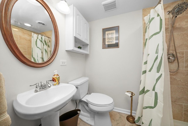 7513 Rohrer Dr, Downers Grove, IL 60516 - full bath with a tile shower, toilet, visible vents, and a sink