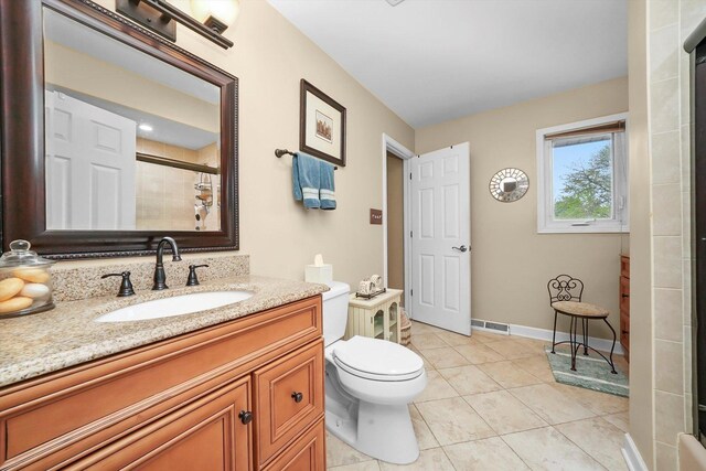 7513 Rohrer Dr, Downers Grove, IL 60516 - bathroom featuring toilet, a tile shower, tile patterned floors, visible vents, and vanity