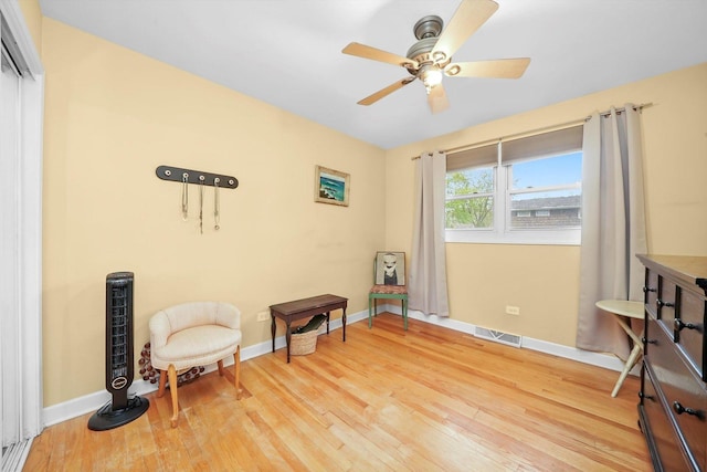 7513 Rohrer Dr, Downers Grove, IL 60516 - sitting room with ceiling fan, baseboards, visible vents, and wood finished floors
