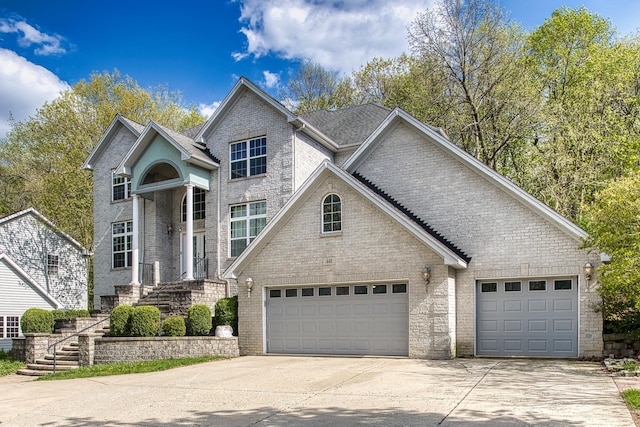 440 Delaware Cir, Bolingbrook, IL 60440 - traditional-style home featuring concrete driveway, brick siding, and an attached garage