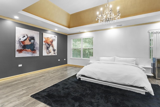 440 Delaware Cir, Bolingbrook, IL 60440 - bedroom with a chandelier, wood finished floors, ornamental molding, a raised ceiling, and recessed lighting