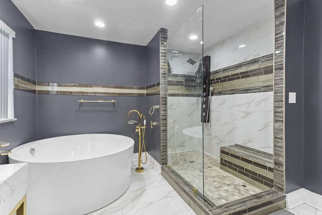 440 Delaware Cir, Bolingbrook, IL 60440 - full bathroom with marble finish flooring, a shower stall, a freestanding bath, and recessed lighting