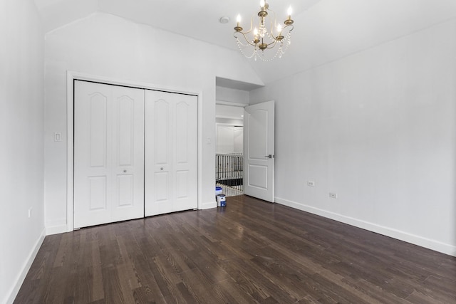 440 Delaware Cir, Bolingbrook, IL 60440 - unfurnished bedroom with vaulted ceiling, a chandelier, dark wood-type flooring, and a closet
