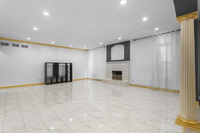 440 Delaware Cir, Bolingbrook, IL 60440 - unfurnished living room featuring recessed lighting, decorative columns, and a fireplace