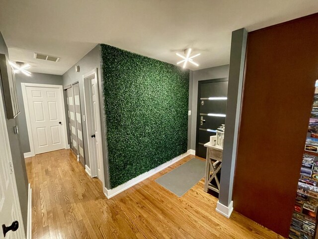 443 Indianwood Dr, Carol Stream, IL 60188 - hall with light wood finished floors and baseboards