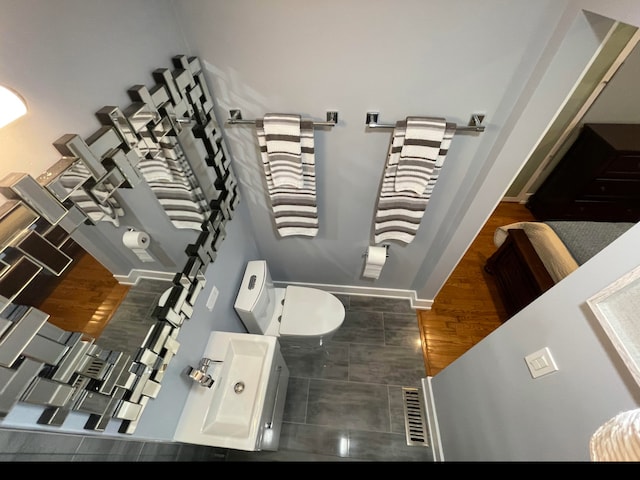 443 Indianwood Dr, Carol Stream, IL 60188 - bathroom with wood finished floors and baseboards