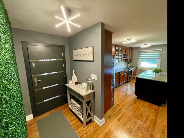 443 Indianwood Dr, Carol Stream, IL 60188 - entrance foyer featuring light wood-type flooring and baseboards