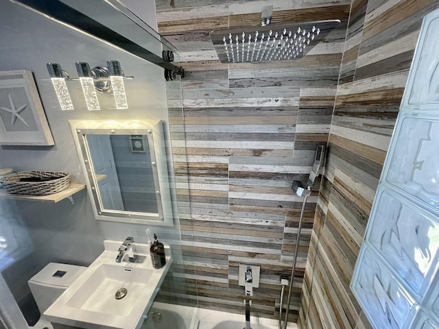 443 Indianwood Dr, Carol Stream, IL 60188 - full bath with wooden walls, a tile shower, and a sink