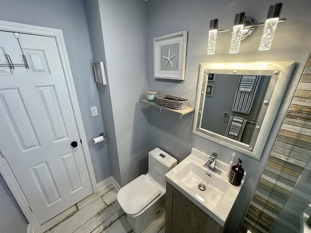 443 Indianwood Dr, Carol Stream, IL 60188 - bathroom with toilet, vanity, and baseboards
