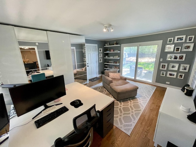 443 Indianwood Dr, Carol Stream, IL 60188 - bedroom with wood finished floors, an office area, access to exterior, baseboards, and crown molding