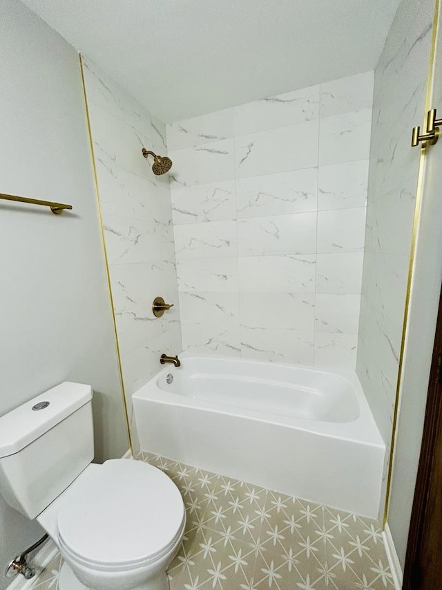 full bathroom featuring tile patterned floors, toilet, and washtub / shower combination