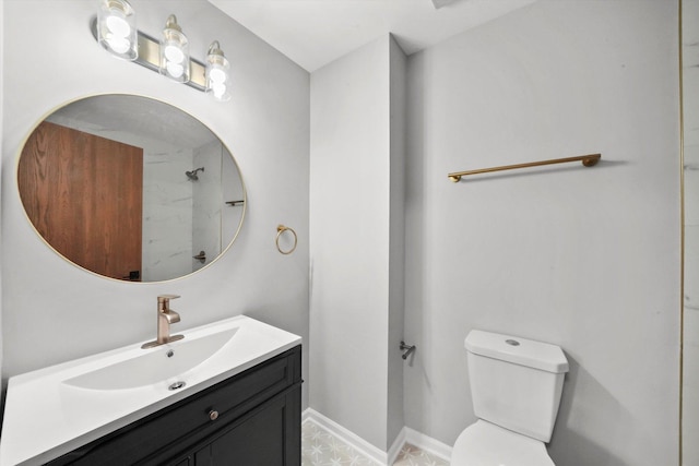 full bathroom featuring toilet, vanity, baseboards, and a shower