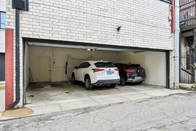 3940 N Ashland Ave Unit 2N, Chicago, IL 60613 - garage featuring a garage door opener