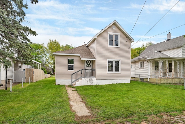 622 E Joliet St, Ottawa, IL 61350 - rear view of house with a shingled roof