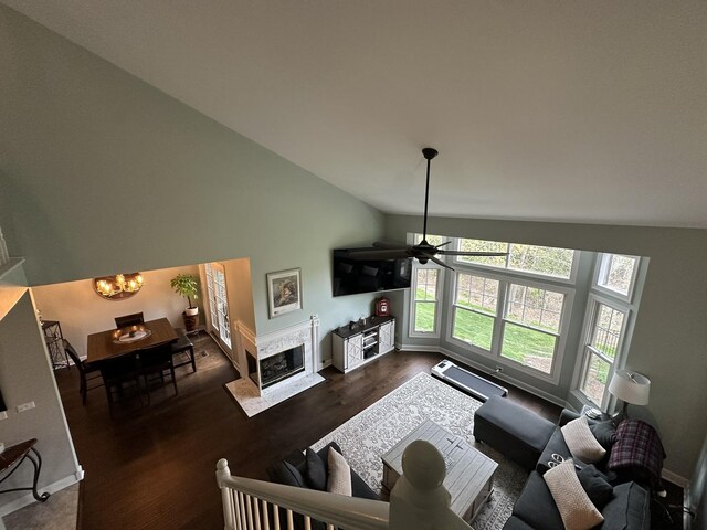 14609 Morningside Rd, Orland Park, IL 60462 - living area featuring a chandelier, wood finished floors, ceiling fan, a fireplace, and baseboards