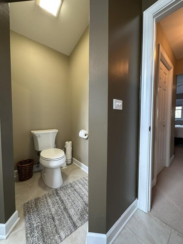 14609 Morningside Rd, Orland Park, IL 60462 - bathroom with toilet, tile patterned floors, and baseboards