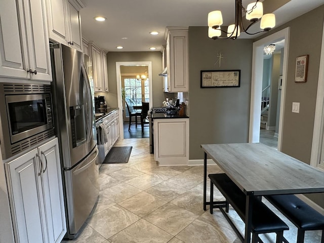 14609 Morningside Rd, Orland Park, IL 60462 - kitchen with a chandelier, stainless steel appliances, dark countertops, recessed lighting, and baseboards