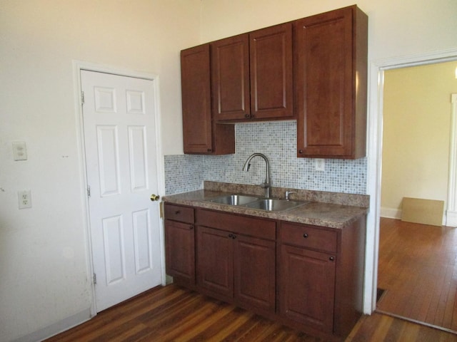 8742 S Racine Ave, Chicago, IL 60620 - kitchen with a sink, dark wood finished floors, and tasteful backsplash