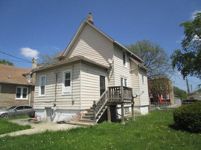 8742 S Racine Ave, Chicago, IL 60620 - back of house with a chimney