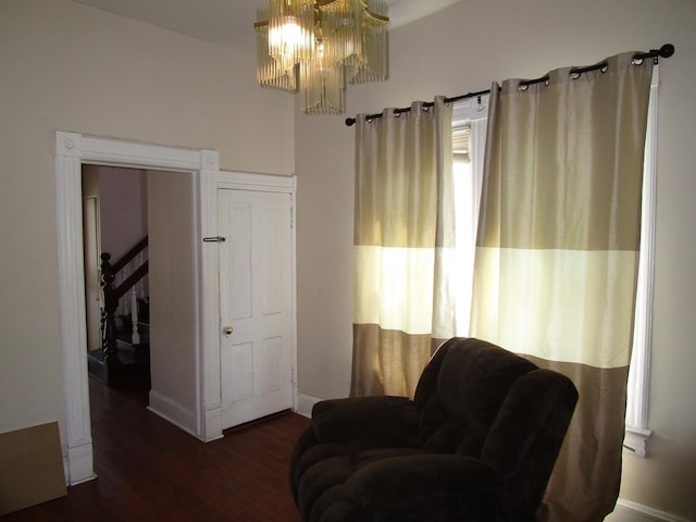 8742 S Racine Ave, Chicago, IL 60620 - sitting room featuring wood finished floors, a chandelier, and baseboards