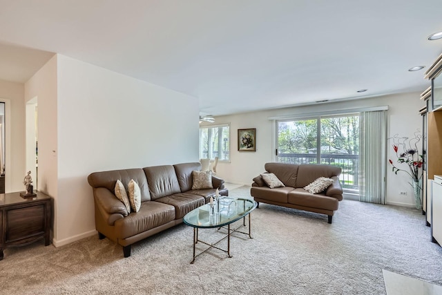 living area with carpet floors, baseboards, ceiling fan, and recessed lighting