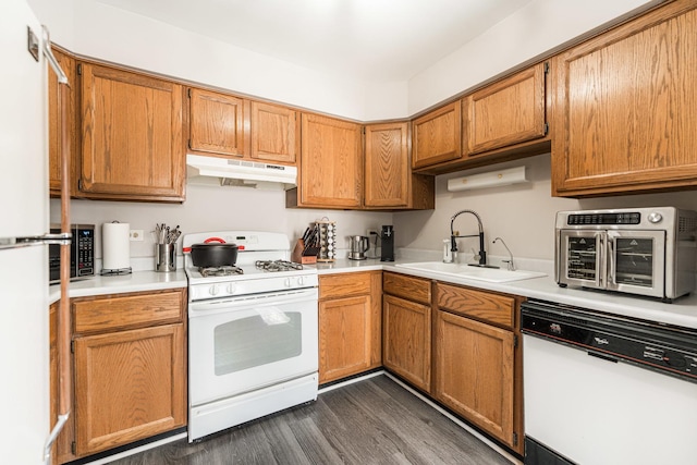 931 Old Oak Cir, Algonquin, IL 60102 - kitchen featuring white appliances, under cabinet range hood, a sink, light countertops, and dark wood finished floors