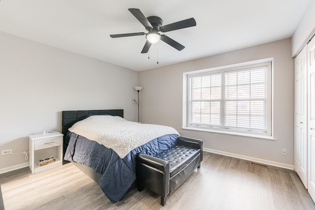 931 Old Oak Cir, Algonquin, IL 60102 - bedroom with wood finished floors, baseboards, a closet, and ceiling fan