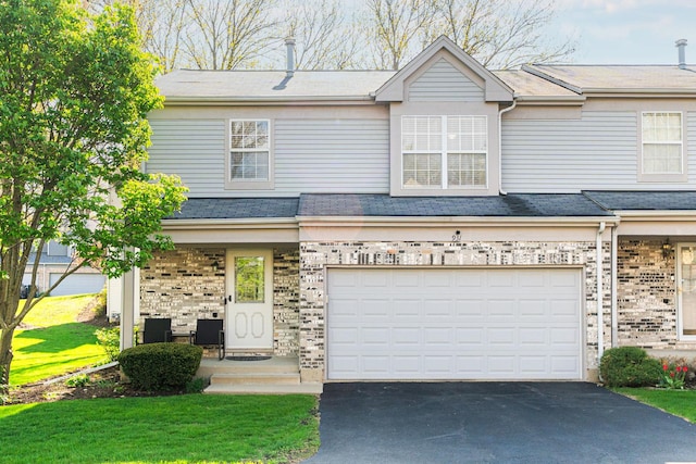 931 Old Oak Cir, Algonquin, IL 60102 - view of front of house featuring asphalt driveway, an attached garage, a front lawn, and brick siding