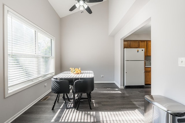 931 Old Oak Cir, Algonquin, IL 60102 - dining room with a ceiling fan, dark wood-style floors, lofted ceiling, and baseboards