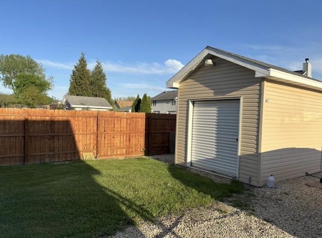 exterior space with fence and an outdoor structure