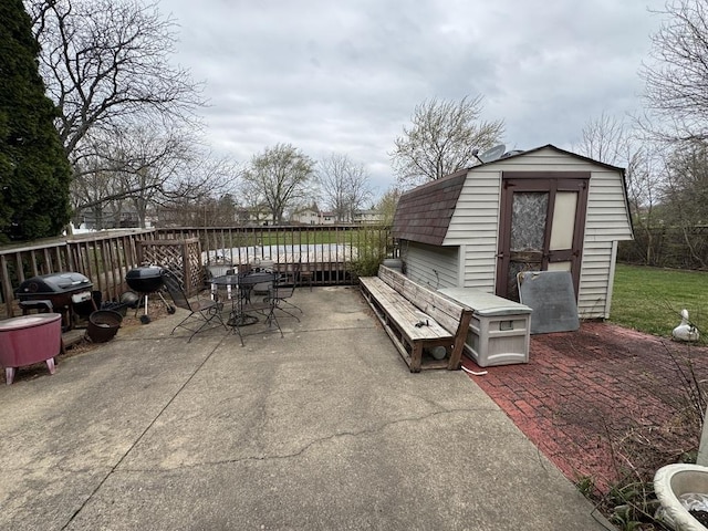 5712 Crestwood Rd, Matteson, IL 60443 - view of patio / terrace featuring a storage shed, an outbuilding, outdoor dining area, and area for grilling