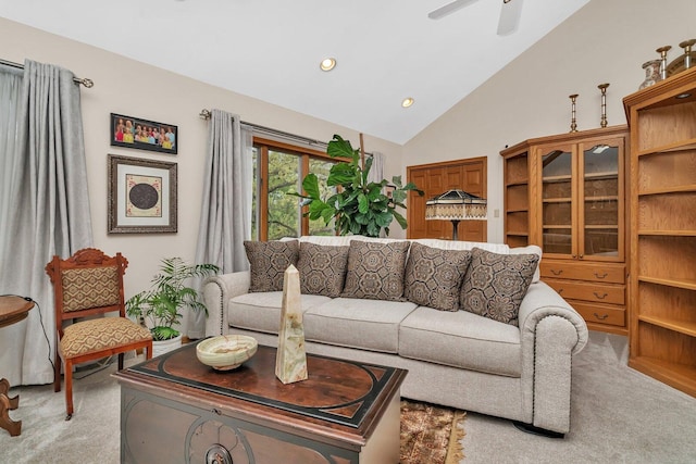 living room with light colored carpet, high vaulted ceiling, a ceiling fan, and recessed lighting