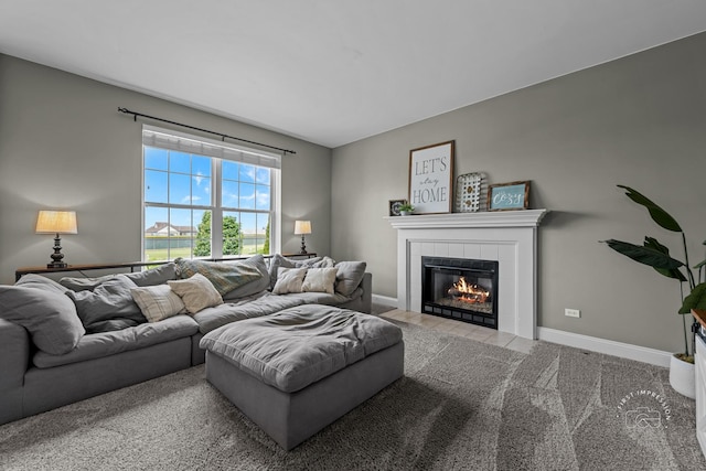 2027 Heatherstone Ct, Plainfield, IL 60586 - living area with a tiled fireplace and baseboards