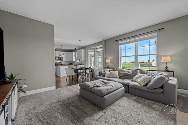 2027 Heatherstone Ct, Plainfield, IL 60586 - carpeted living room with baseboards