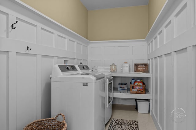 2027 Heatherstone Ct, Plainfield, IL 60586 - washroom featuring washing machine and clothes dryer and light tile patterned floors