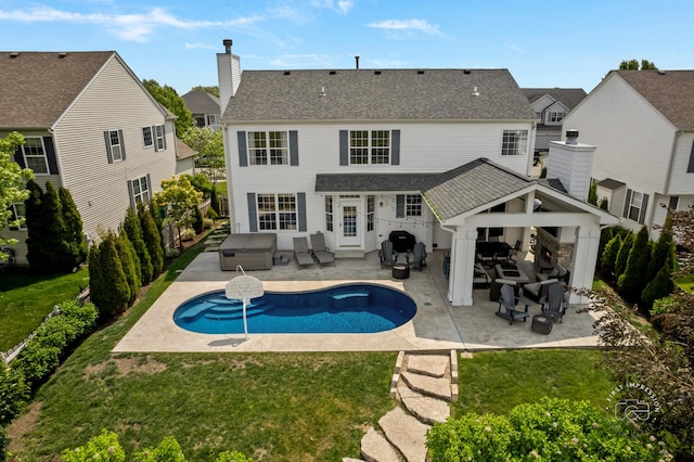 2027 Heatherstone Ct, Plainfield, IL 60586 - rear view of house with outdoor lounge area, a patio area, and a lawn