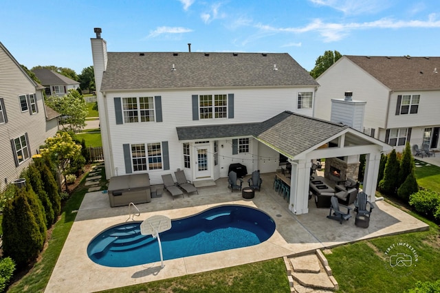 2027 Heatherstone Ct, Plainfield, IL 60586 - back of house featuring a gazebo, an outdoor living space, roof with shingles, and a patio