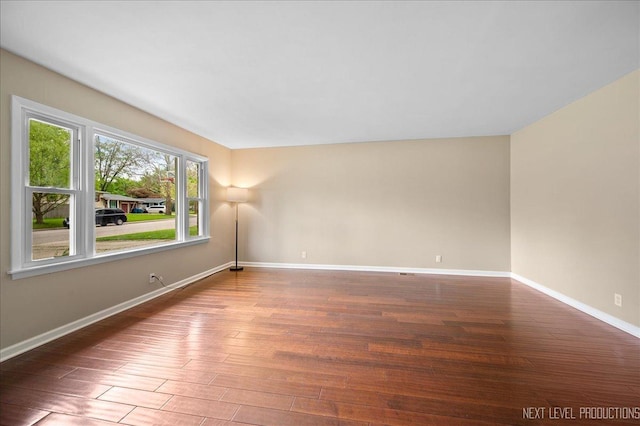 16 Circle Dr E, Montgomery, IL 60538 - unfurnished room featuring baseboards and wood finished floors