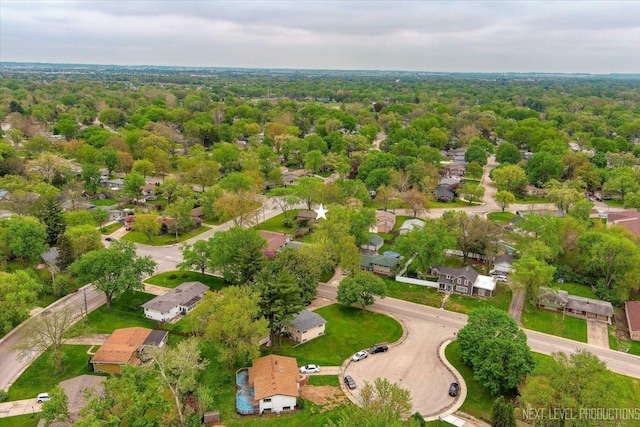 16 Circle Dr E, Montgomery, IL 60538 - aerial perspective of suburban area with a heavily wooded area